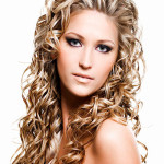 Beautiful woman with  blonde long ringlets hair